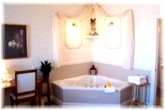 Relax in a large two person soaker tub and enjoy your private ensuite bath and shower.