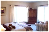 Our luxury King Suite features panaromic waterfront views, Satellite TV / VCR, a quality King bed and duvet.